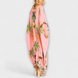Linda - Vestido impresionante con tirantes asimétricos y estampado de palmeras
